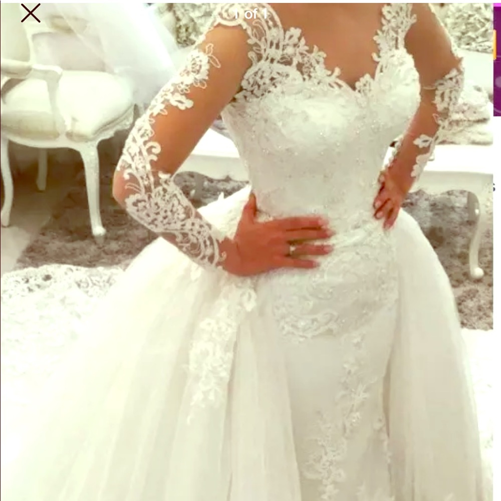 Size 14 wedding dress. 2 piece light ivory color